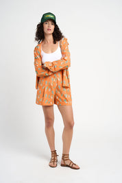 Short Nils orange à motifs coquillages