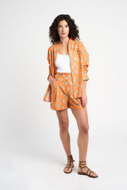 Short Nils orange à motifs coquillages